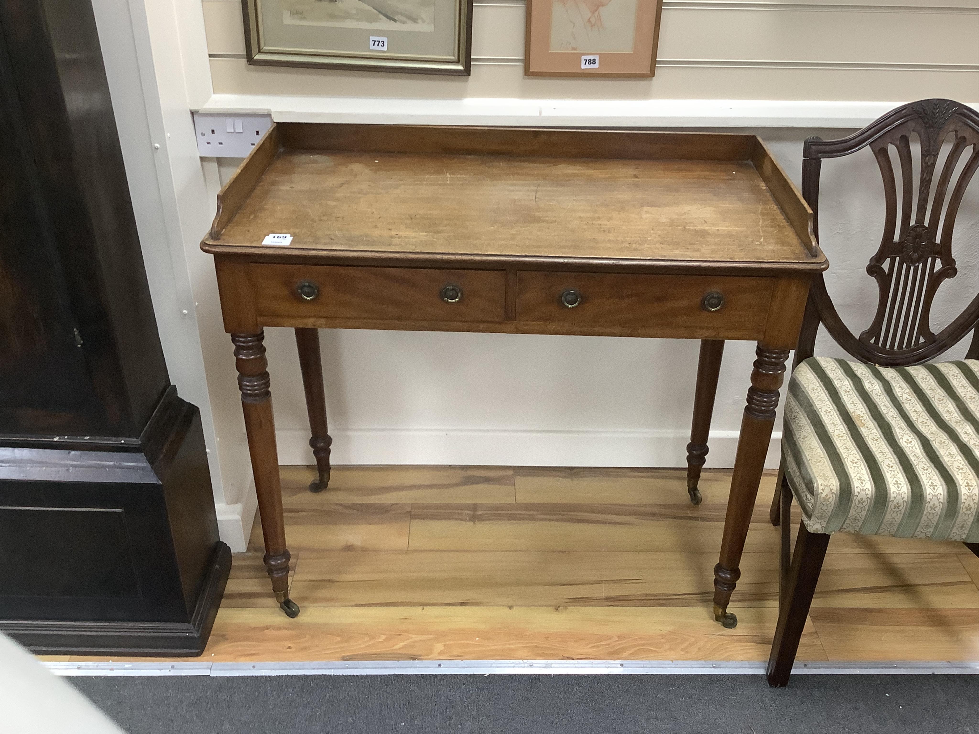 A Regency mahogany washstand, width 93cm, depth 47cm, height 83cm. Condition - fair